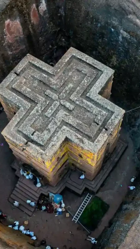A stunning aerial view of Bete Giyorgis, the iconic rock-hewn church in Lalibela, Ethiopia. House of St. George Church.